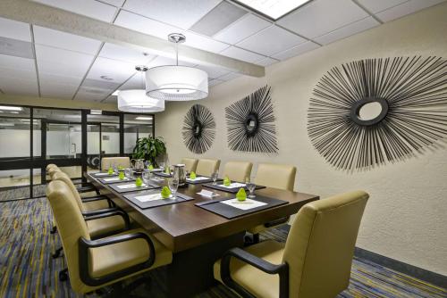 a conference room with a long table and chairs at DoubleTree by Hilton Phoenix North in Phoenix