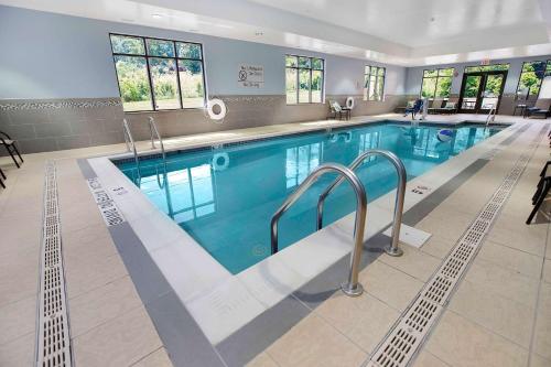 a large swimming pool with blue water at Hampton Inn Bridgeville in Bridgeville
