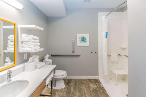 a bathroom with a sink and a toilet and a shower at Hampton Inn Pensacola Beach in Pensacola Beach