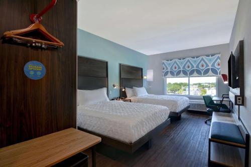מיטה או מיטות בחדר ב-Tru By Hilton Fort Walton Beach, Fl