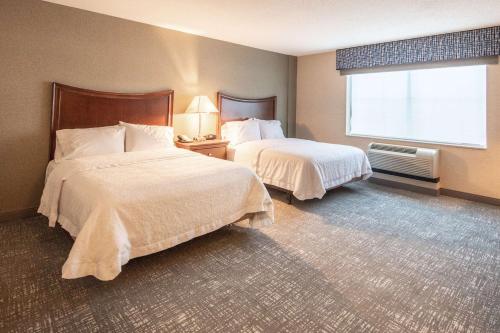 Ένα ή περισσότερα κρεβάτια σε δωμάτιο στο Hampton Inn Presque Isle