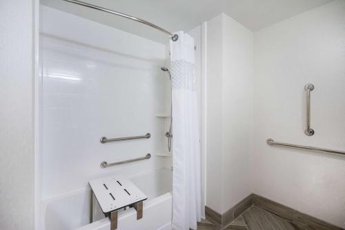 a bathroom with a shower and a toilet at Hampton Inn by Hilton Oxford, ME in Oxford
