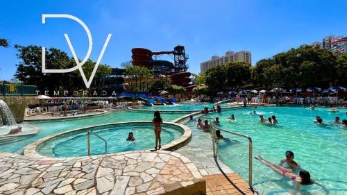 Bazén v ubytování Hotel Spazzio com Acesso Grátis Ao Acqua Park diRoma nebo v jeho okolí