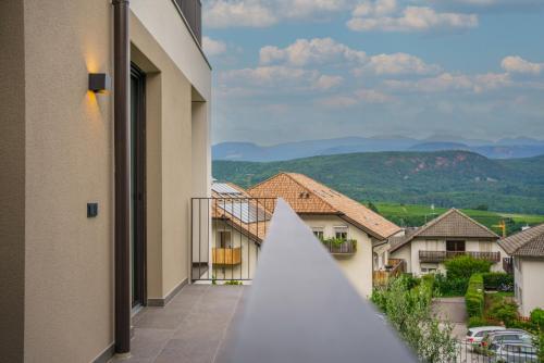a view from the balcony of a building at Auszait Apartments 1 in Caldaro