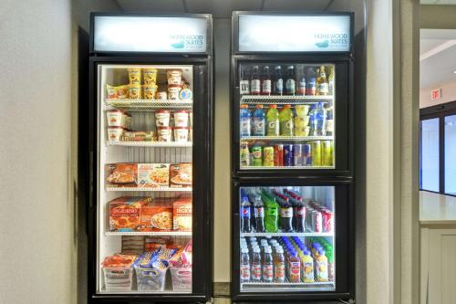 two refrigerators with their doors open with food and drinks at Homewood Suites by Hilton Reno in Reno