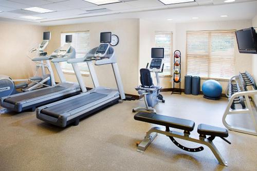 a gym with treadmills and machines in a room at Homewood Suites by Hilton Carlsbad-North San Diego County in Carlsbad