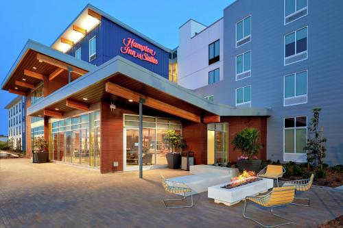 an exterior view of the entrance to a hotel at Hampton Inn & Suites San Diego Airport Liberty Station in San Diego