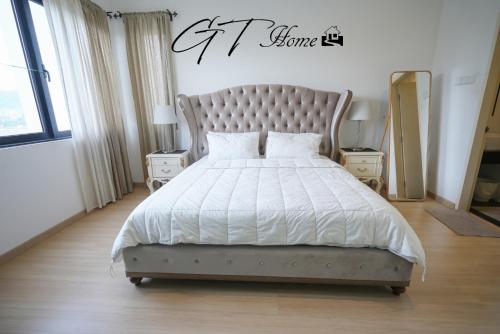 Postel nebo postele na pokoji v ubytování Gt Home encorp strand residence (alpha ivf )
