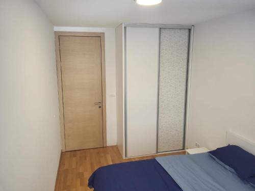 Ένα ή περισσότερα κρεβάτια σε δωμάτιο στο Luxurios Apartment Sarajevo