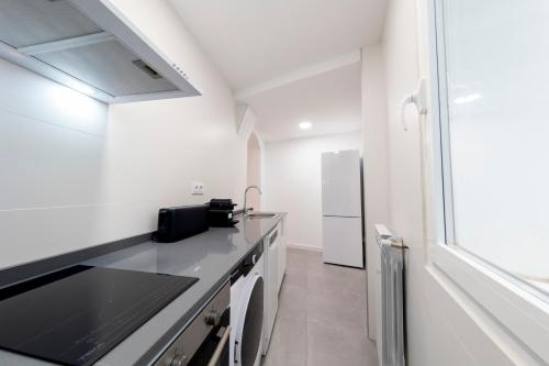 Kuchyň nebo kuchyňský kout v ubytování DWO Ábaster Suites