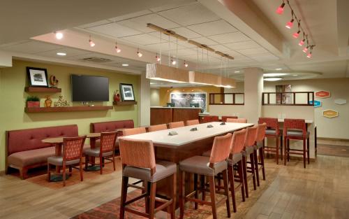 a large dining room with a large table and chairs at Hampton Inn Salt Lake City/Sandy in Sandy