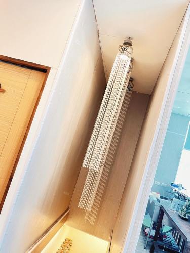 a tall building on the wall of a room at 20ft Sea Attic in Green Island