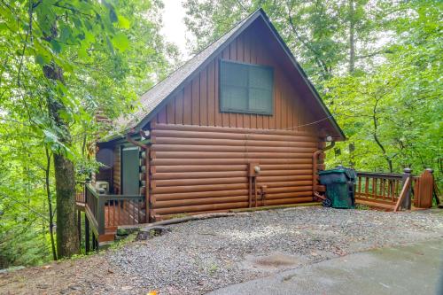 a log cabin in the woods with a driveway at Deer Haven Cabin 5 Mi to Dtwn Blue Ridge! in Blue Ridge