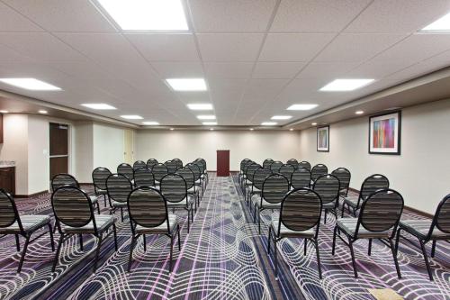 a conference room with rows of chairs in it at Hampton Inn Seattle/Everett Downtown in Everett
