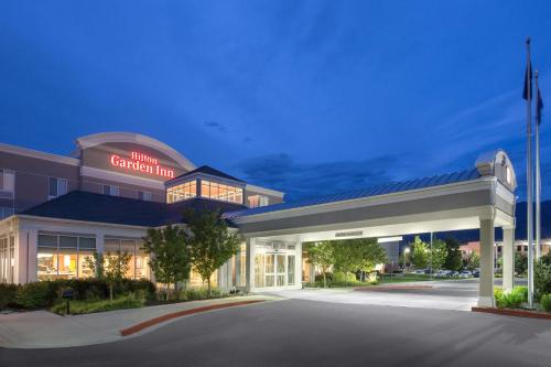 a hotel carolina inn building with a parking lot at Hilton Garden Inn Salt Lake City/Layton in Layton