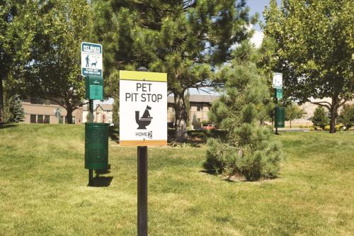 a sign for a pet pitstop in a park at Home2 Suites by Hilton Lehi/Thanksgiving Point in Lehi