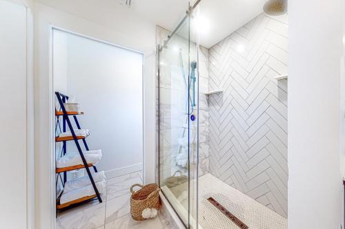 a shower in a bathroom with a glass shower stall at Salisbury Sanctuary in Salisbury