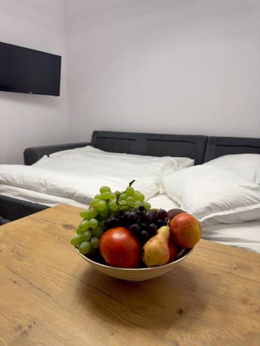 a bowl of fruit sitting on a table at Holiday Home Korda in Čapljina