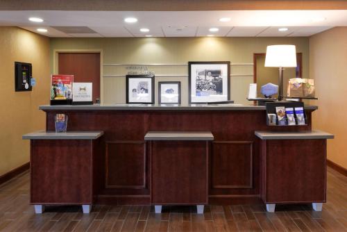 a lobby of a hospital with a reception counter at Hampton Inn & Suites St. Louis - Edwardsville in Glen Carbon