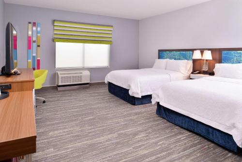 Voodi või voodid majutusasutuse Hampton Inn & Suites Saint Paul Oakdale Woodbury toas
