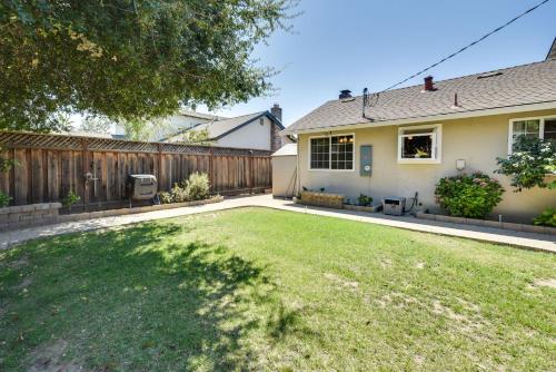 a house with a yard with a fence at Campbell Vacation Rental about 8 Mi to San Jose! in Campbell