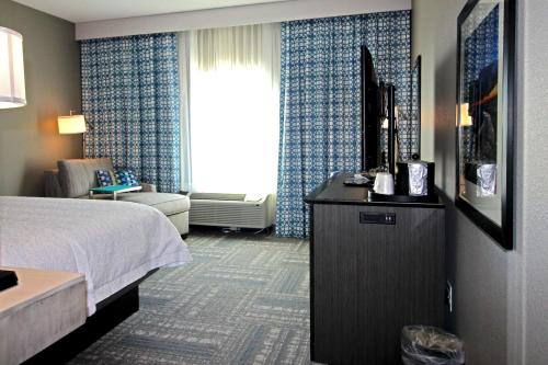 Ένα ή περισσότερα κρεβάτια σε δωμάτιο στο Hampton Inn West Plains