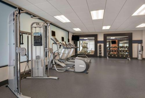 a gym with treadmills and machines in a room at Hampton Inn and Suites Robbinsville in Robbinsville