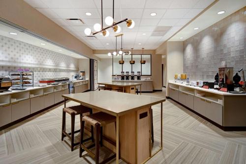 a large kitchen with a island in a store at Hampton Inn Tucson Downtown, Az in Tucson