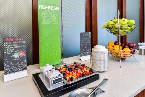 a table with a tray of fruit on a counter at Hampton Inn & Suites Boulder North in Boulder