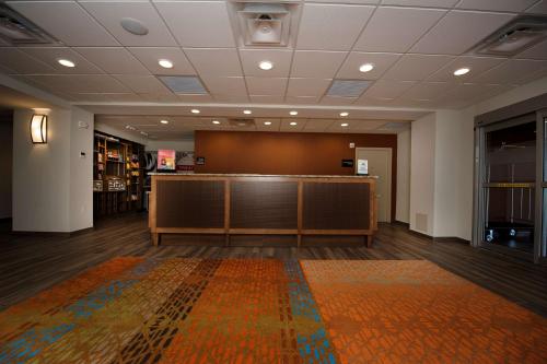 a meeting room with a large screen and a podium at Hampton Inn & Suites Truro, NS in Truro
