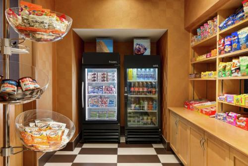 a store with two refrigerators in a room at Hampton Inn & Suites by Hilton Langley-Surrey in Surrey