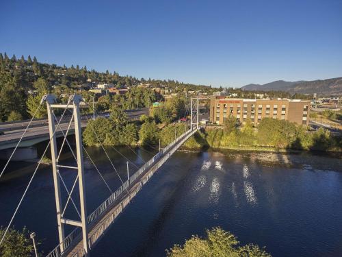 a bridge over a river next to a city at Hampton Inn & Suites Hood River in Hood River
