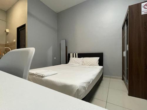 Reno Hotel Ipohにあるベッド