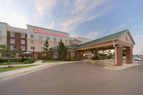 a rendering of a hotel building with a parking lot at Hilton Garden Inn Lawton-Fort Sill in Lawton