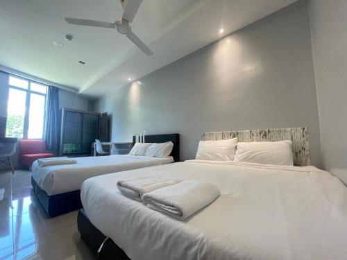 Reno Hotel Ipohにあるベッド