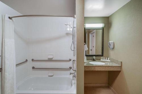 a bathroom with a shower and a sink at Hilton Garden Inn Augusta in Augusta