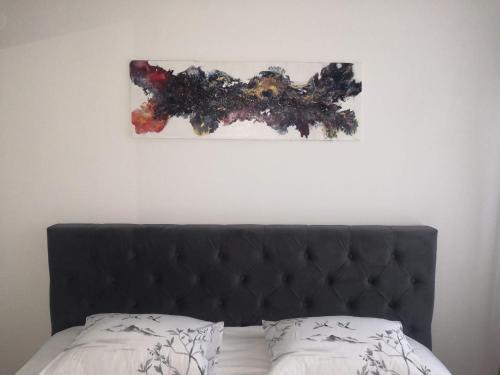 Apartman Deniにあるベッド
