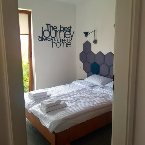 Ένα ή περισσότερα κρεβάτια σε δωμάτιο στο Apartament Rodzinny Sarbinowo