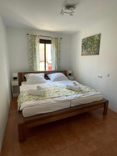 Ένα ή περισσότερα κρεβάτια σε δωμάτιο στο Casa de Limon