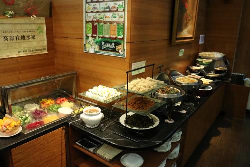 a buffet line with many different types of food at King's Town Hotel in Kaohsiung