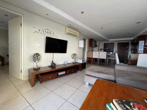 TV a/nebo společenská místnost v ubytování Nautica Flat 301