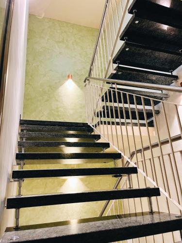 a set of stairs in a building at Hotel & Restaurant Hubertus Sehnde in Sehnde