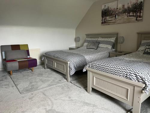 Postel nebo postele na pokoji v ubytování Sleadrin View B&B