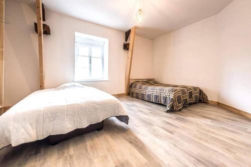 Katil atau katil-katil dalam bilik di Grande maison de Vacances avec SPA