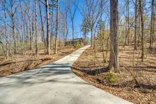a road in the middle of the woods at Romantic, Cozy Loft with Yard, 5 Miles to Clemson in Central