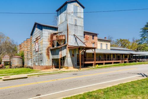 an old building on the side of a road at Romantic, Cozy Loft with Yard, 5 Miles to Clemson in Central