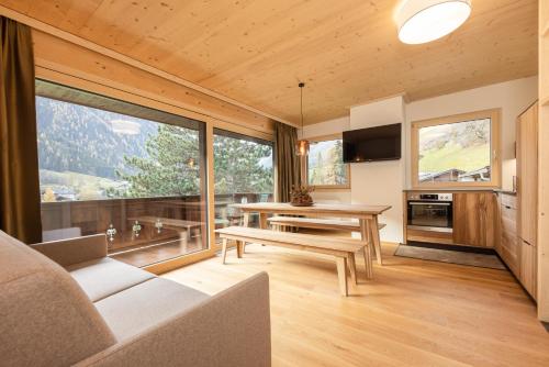 TV a/nebo společenská místnost v ubytování Pension Gulla - Ferienhaus Appartements B&B