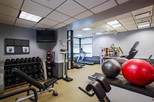 a gym with a lot of exercise equipment at DoubleTree by Hilton Chicago/Alsip in Alsip