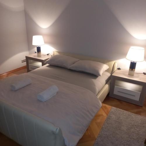 Postel nebo postele na pokoji v ubytování Nova DOM