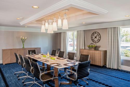 a conference room with a long table and chairs at Hilton Wilmington/Christiana in Newark